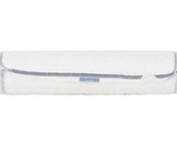 A white cylindrical mattress wrapped in clear plastic packaging, shown horizontally against a plain white background.