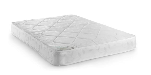 A white quilted mattress topper or mattress pad with a diamond pattern, shown at an angle on a white background.