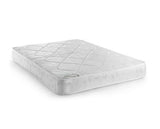 A white quilted mattress topper or mattress with a diamond-patterned top surface, shown at an angle on a plain white background.