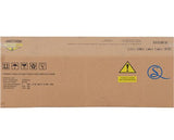 A flat brown cardboard box with printed handling icons, a yellow warning label, and a blue stylized logo on a white background.