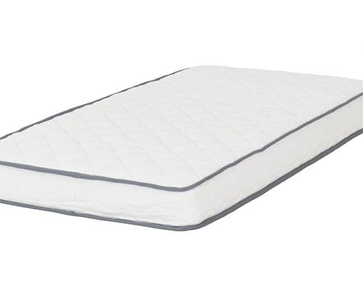 A white quilted mattress with a diamond-stitched pattern and gray piping trim, shown on a plain white background.
