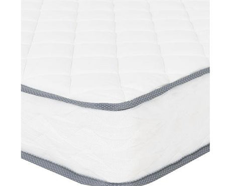 A close-up of a white quilted mattress corner, showing a gray patterned trim along the edge.