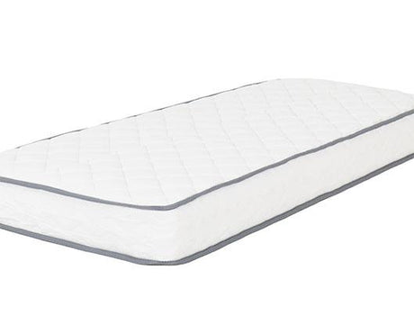 A white quilted mattress with a diamond-stitched pattern and gray piping trim, shown at an angle on a plain white background.