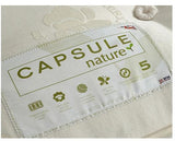 close up image of a mattress label showing the brand CAPSULE NATURE