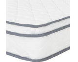 A close-up of a white quilted mattress with gray stitched trim along the edges, shown against a plain white background.