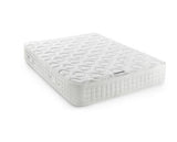 A white quilted king size mattress shown at an angle on a clean white background.